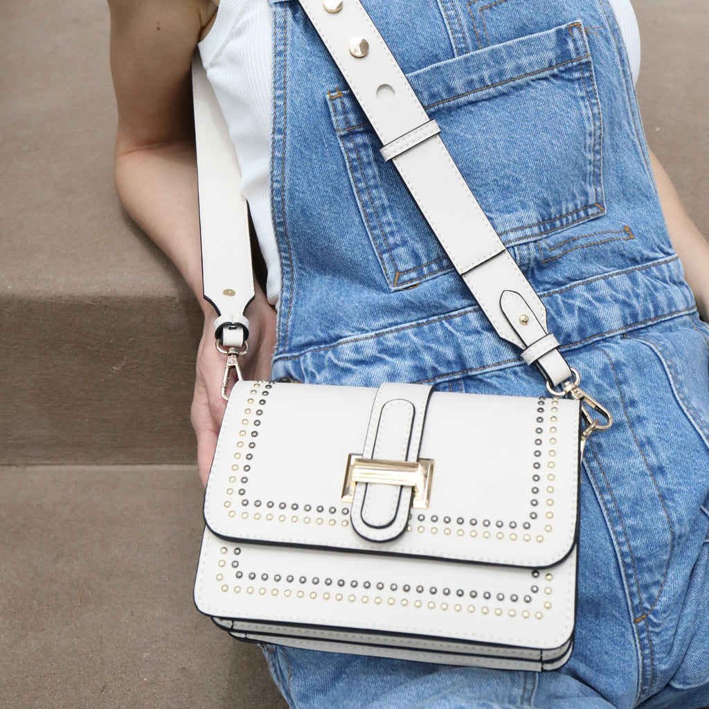 Close up model wearing taupe gold and silver studded camera strap crossbody | Most Wanted USA